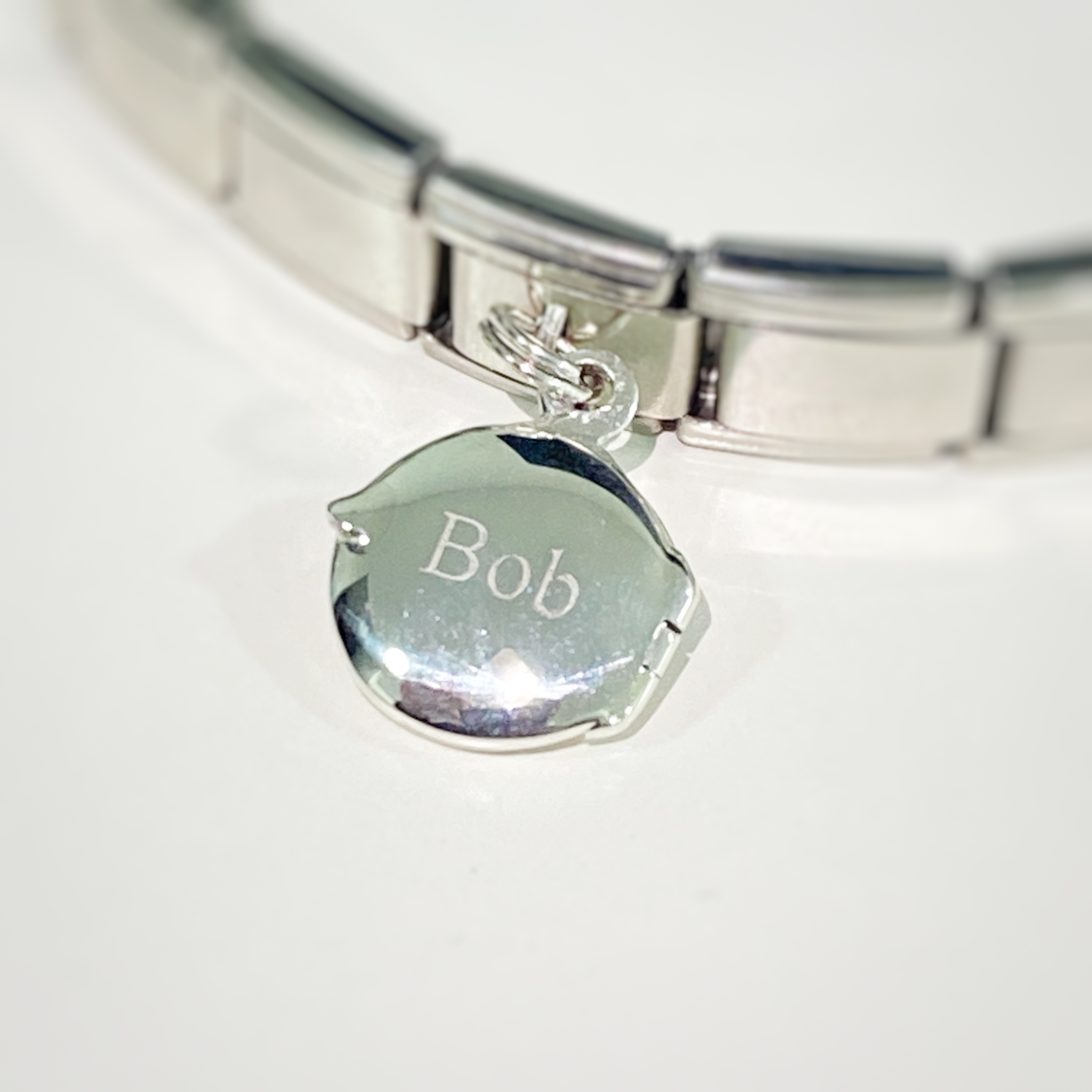 locket on a nomination charm